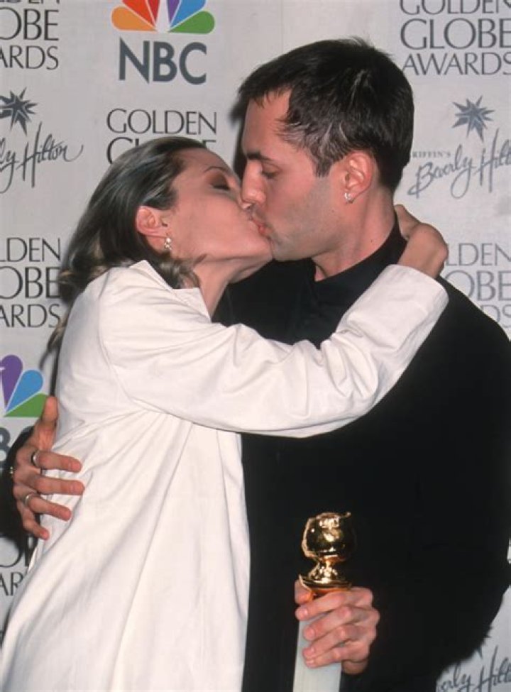 Angelina Jolie kissing her brother on the Oscars Red Carpet still hasn't aged well