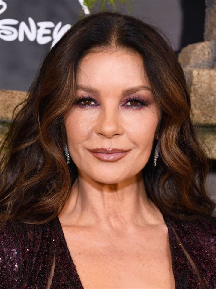 Catherine Zeta-Jones’ 40-year-old ass gets naked & airbrushed for Allure