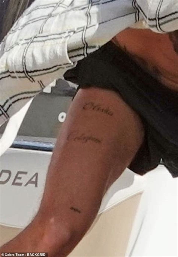 Harry Styles has a tattoo that says ‘Olivia’ on his thigh