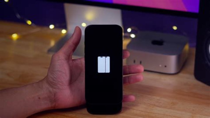 How do I get my iPhone wallpaper to stop moving?