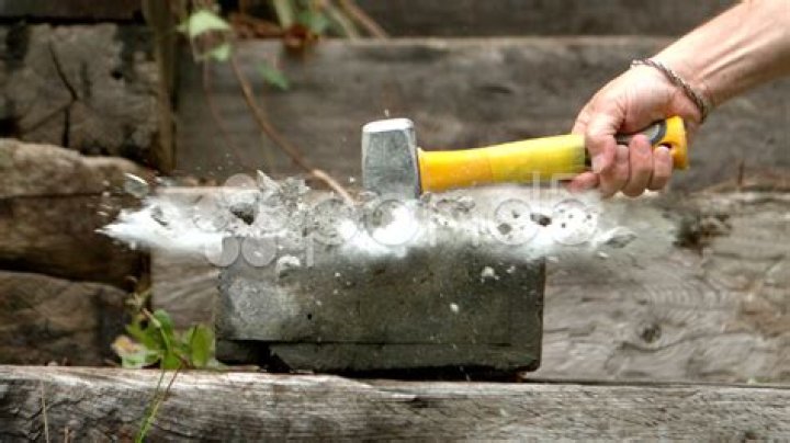 How do you break concrete with a sledge hammer?