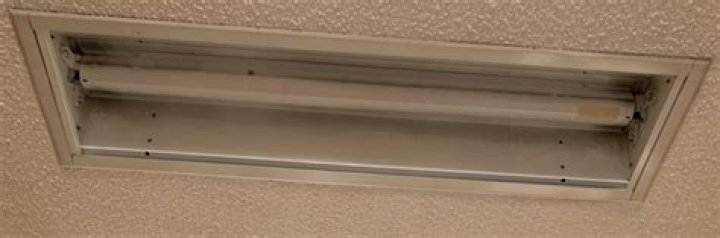 How do you replace a recessed fluorescent light fixture?