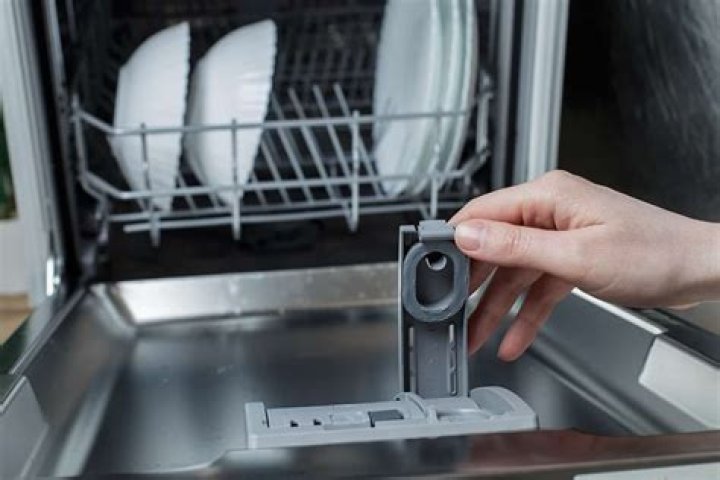 How does the soap door open in a dishwasher?