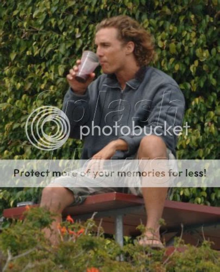 Matthew McConaughey running shirtless & hanging out in a holey bathrobe