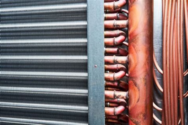 What causes refrigerator evaporator coils to freeze up?