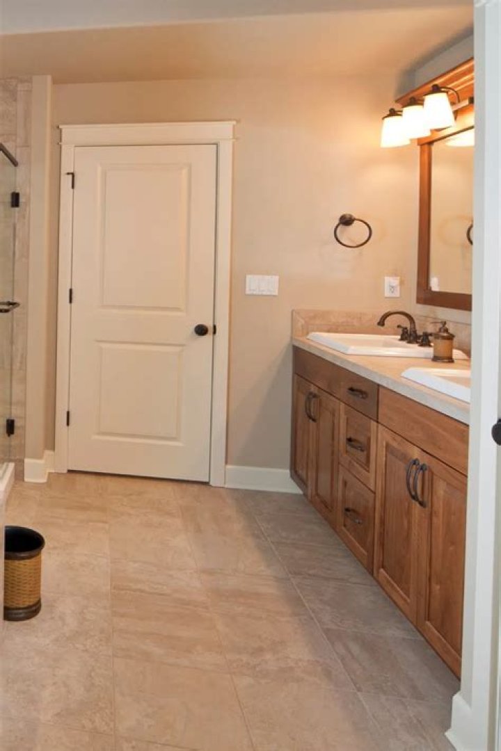 What color goes with brown tile in bathroom?