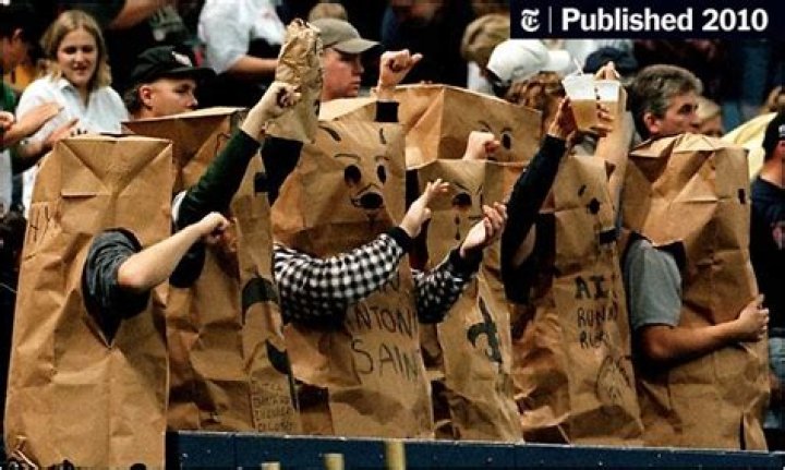 When did Saints fans wear paper bags on their heads?