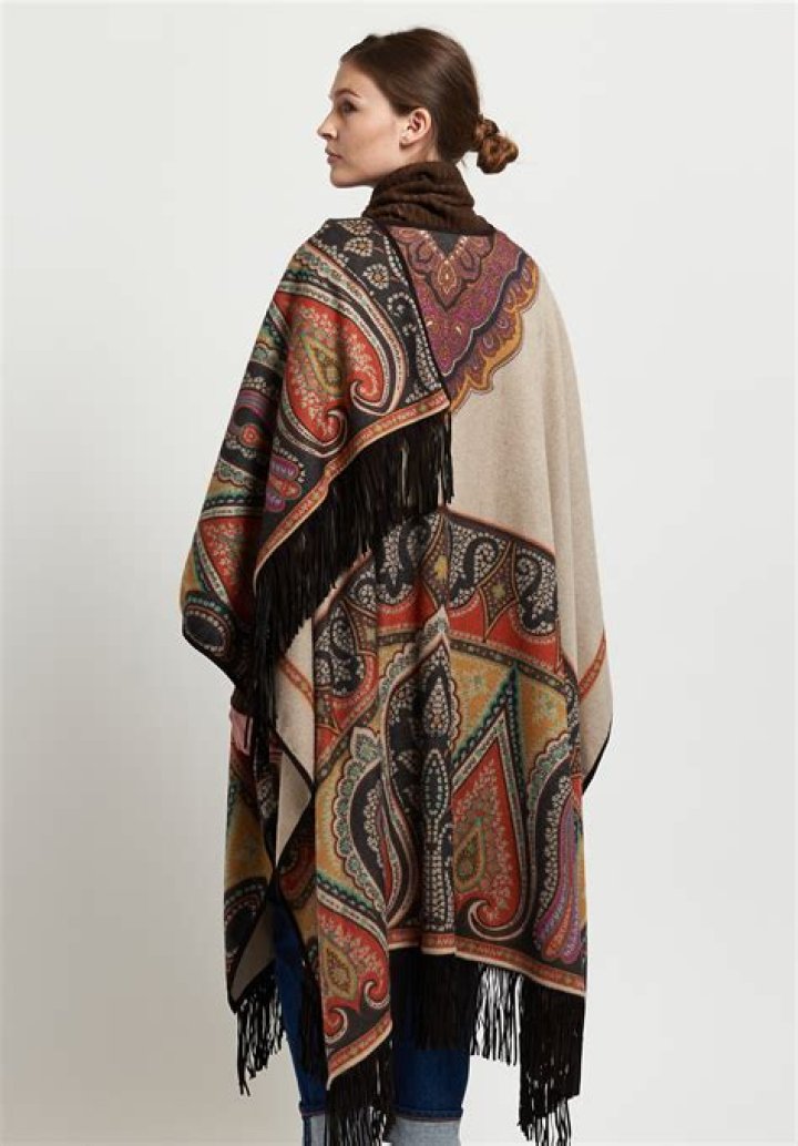 Where did the poncho originate from?