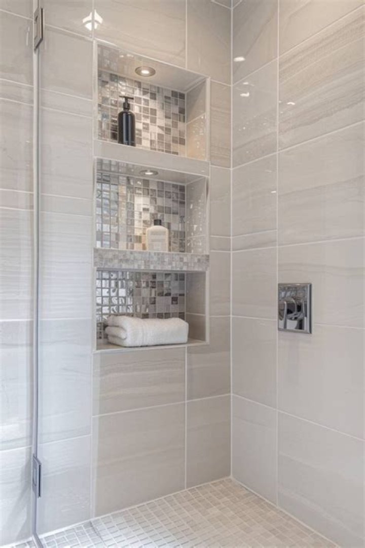Where should shower shelves be placed?