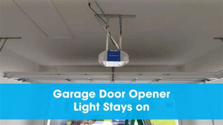 Why does garage door opener light stay on?